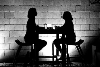 silhouette of two women